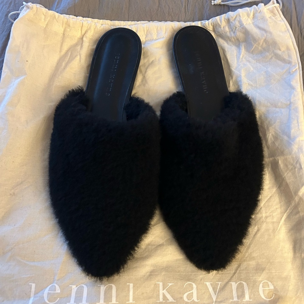 Jenni Kayne Black Shearling Mules - Size EU40
I wear a size 9 and these fit.